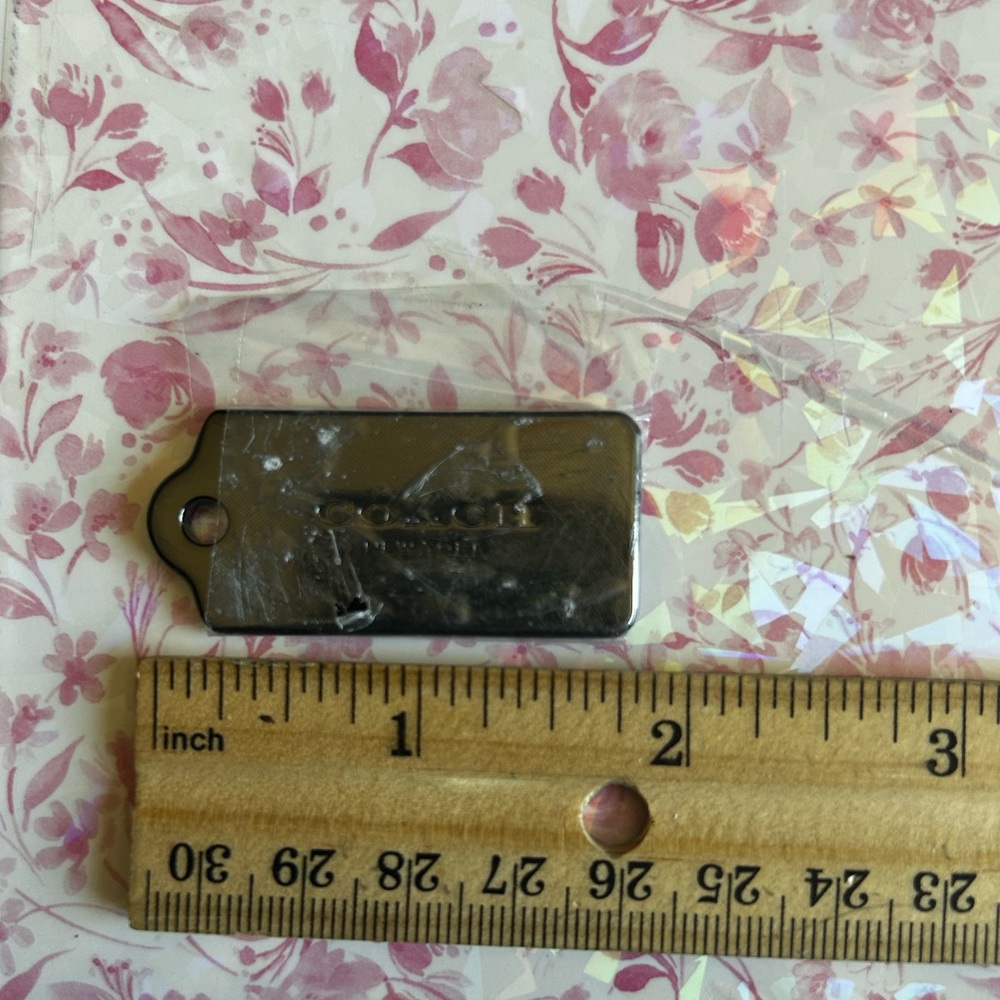 COACH New York bag tag